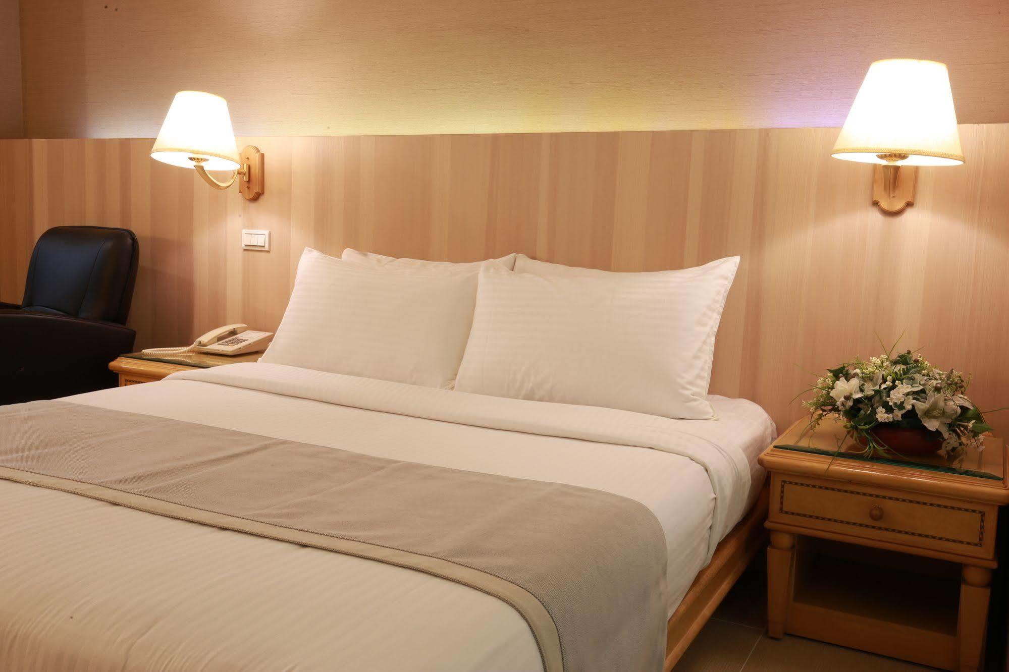 Highness Hotel Guishan Bagian luar foto